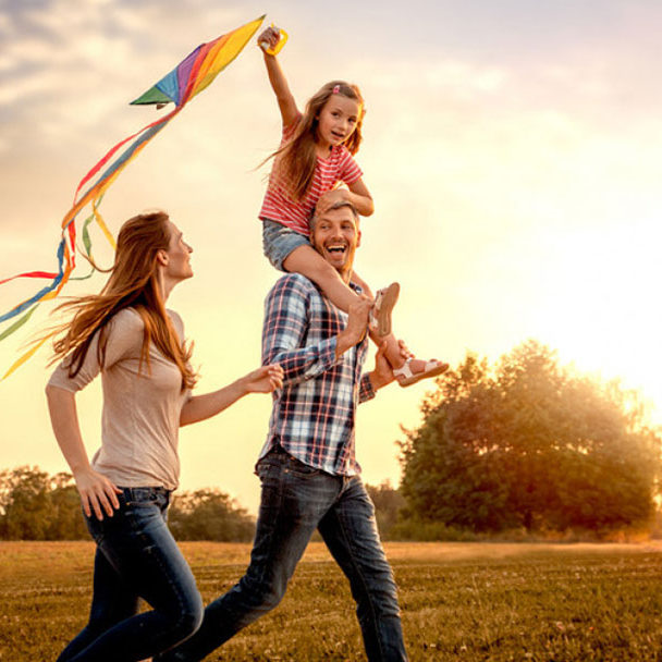 happy family flying a kite